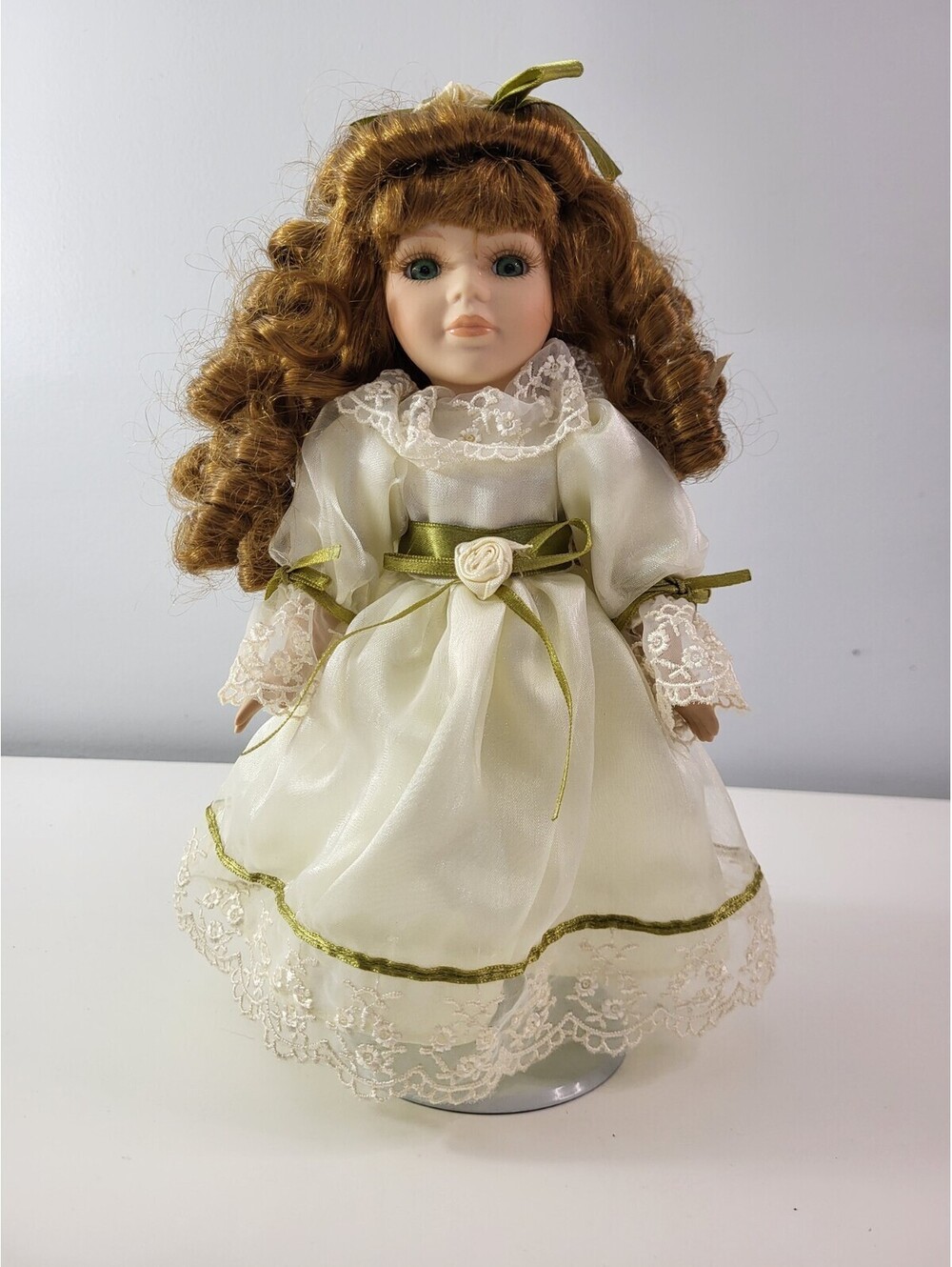 Collectors Choice Porcelain Doll '' Toddler in white sateen  10"